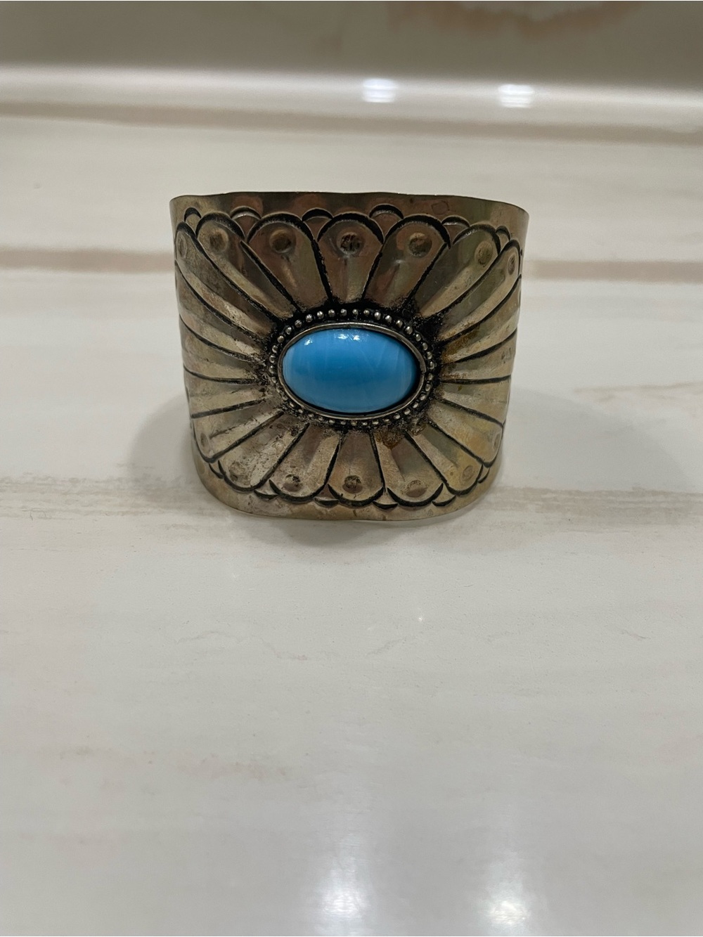 Southwestern-style cuff bracelet.
